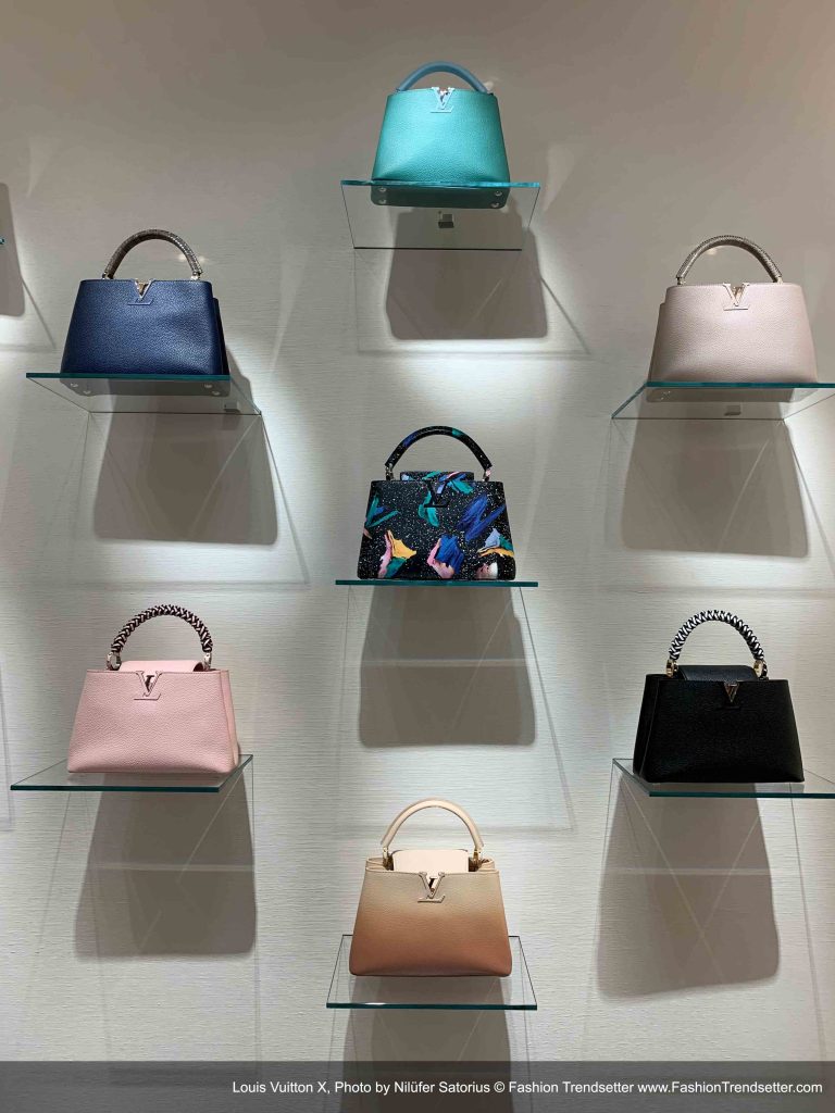 Front architecture of store brand louis vuitton design with light  illumination design. brand about of fashion, bag, accessories woman Stock  Photo