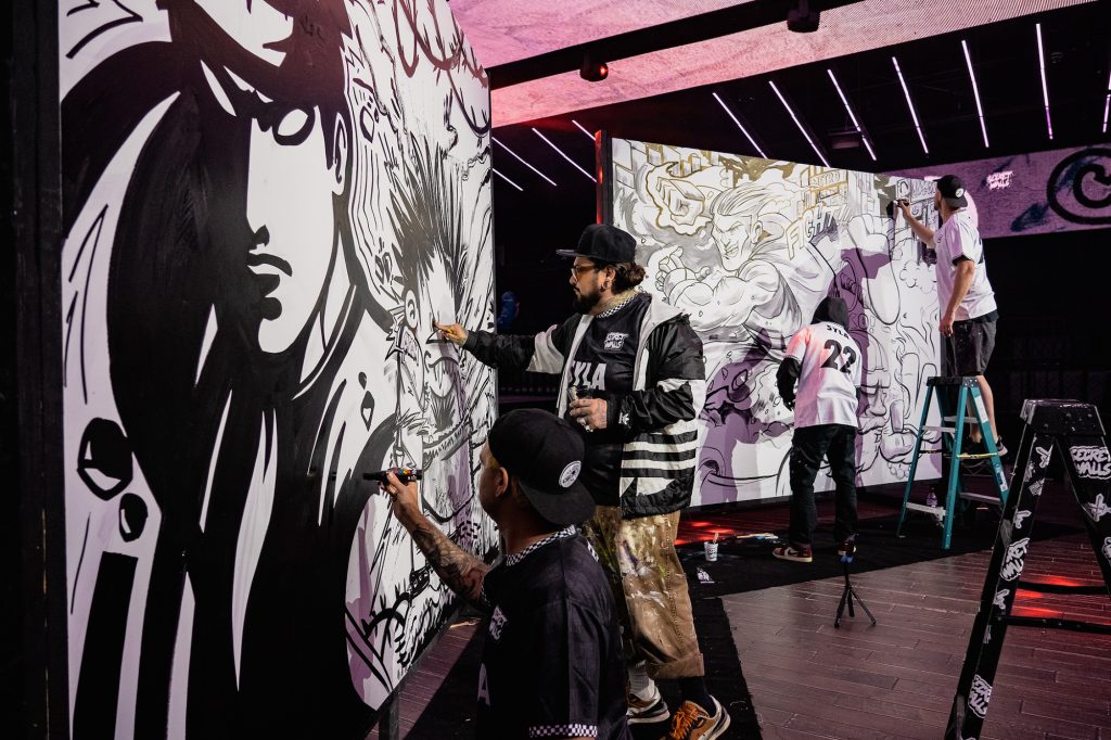 Artists MDMN, Goopmassta, Blue the Great and Captain Kris using POSCA Markers during a Secret Walls Battle at the launch party for Street Fighter 6 in Los Angeles, 2023 (Photo: Jaime Guerrero)