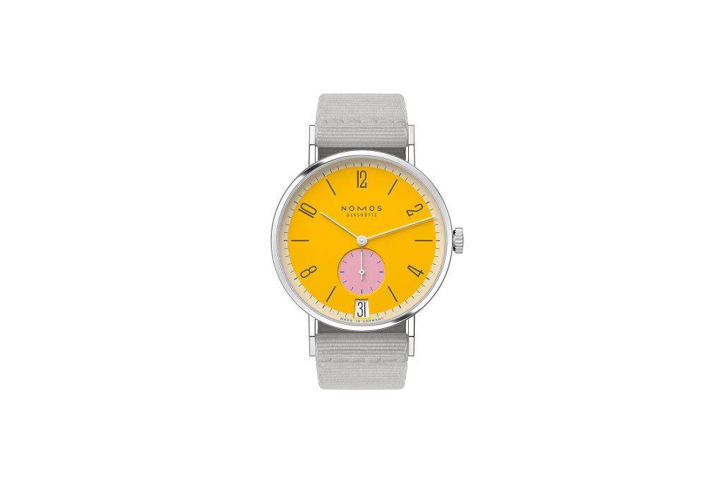 The NOMOS icon in color: Tangente 38 date Katzengold