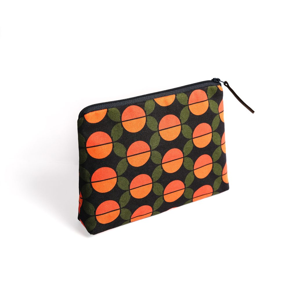 Storigraphic's Seventies 6 — Seventies Series — Larger Zipped Pouch (Travel/Cosmetics)

Zipped and gusseted travel or cosmetic bag from Storigraphic's popular design range, the Seventies Series. Perfect for travel, cosmetics or a bumper collection of pens and pencils.