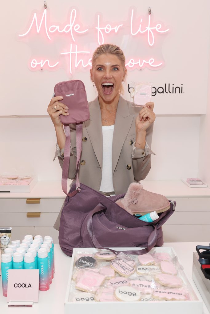 Amanda Kloots packing baggallini's Carryall Expandable Tote.
Photo: Lauren Menowitz/Shutterstock, courtesy of baggallini.