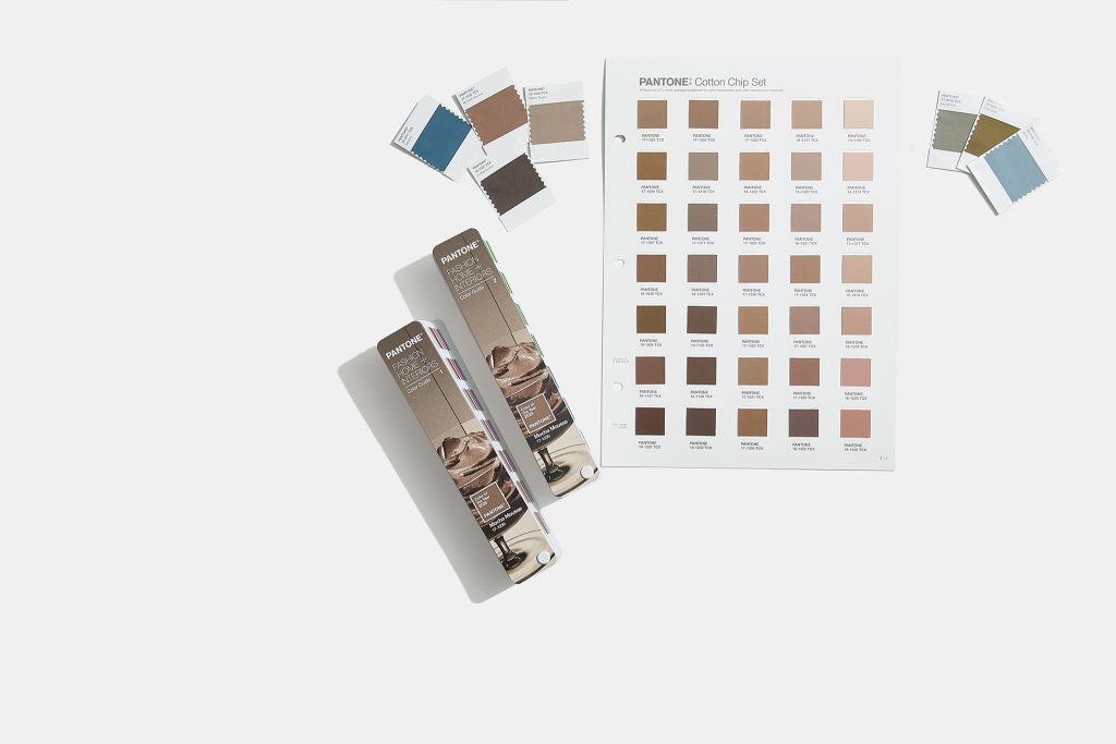 PANTONE® Color of the Year 2025: 17-1230 Mocha Mousse Pantone FHI Color Guide Cotton Chips Book & Cotton Chip Set. 
Photo courtesy of PANTONE®.