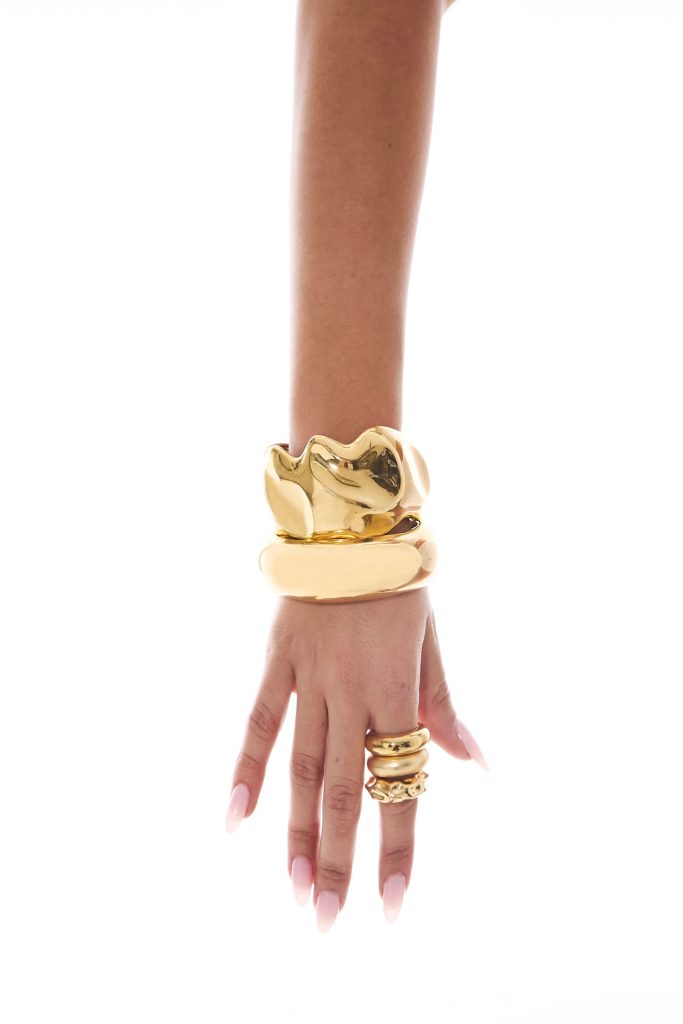 The Dea Bangle, the Xena Cuff and Ealiah Stacked Rings in Gold.