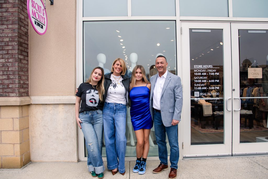 March 15, 2025, New Jersey - The O'Donnell Family - Lana, John and their two daughters - stand proudly in front of the new Scout & Molly's Boutique Cherry Hill on Grand Opening Day. 
Photo Credit: Diana Rossi Photography